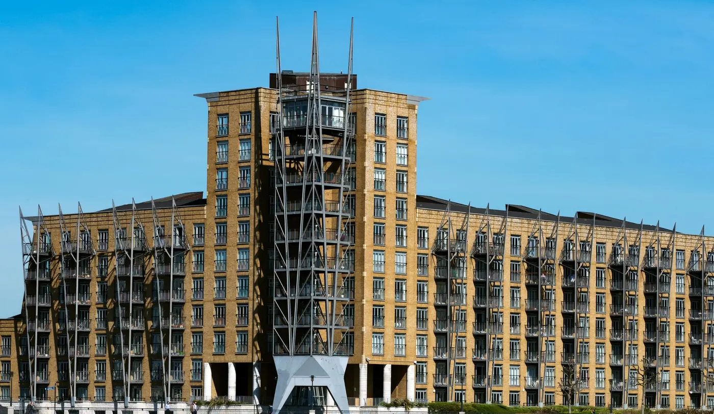 A London riverside apartment block of the kind served by communal risers